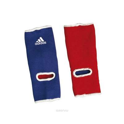 ЗАЩИТА ГОЛЕНОСТОПА С НОСКОМ ДВУХСТОРОННЯЯ ДЛЯ ВЗРОСЛЫХ (СИНЯЯ ИЛИ КРАСНАЯ) 900 OUTSHOCK - купить в интернет-магазине