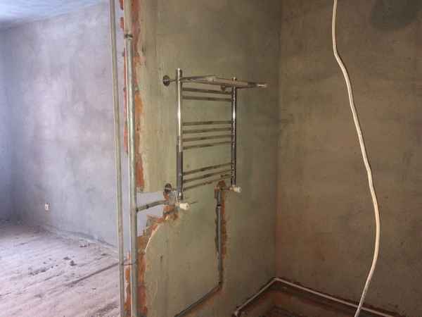 Перенос полотенцесушителя на другую стену — этапы проведения работ