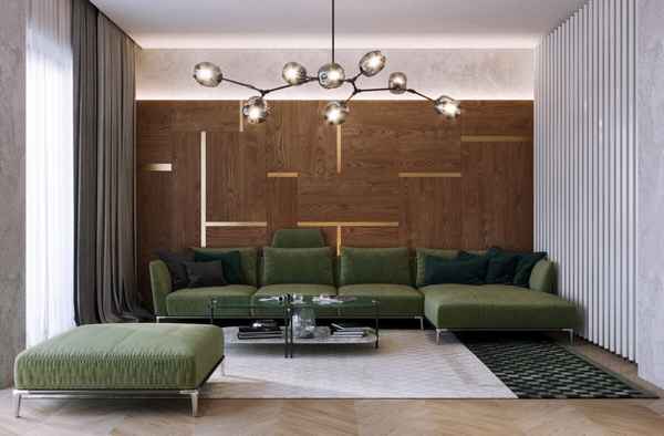 Темно зеленый диван в интерьере гостиной: варианты размещения