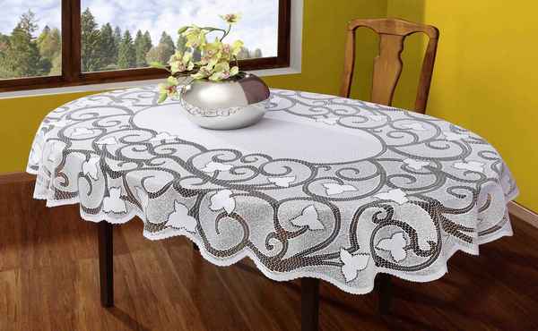 Скатерть на овальный стол для кухни: виниловая, белая и других цветов, достоинства, текстура, материал, размеры
