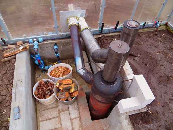 Обогрев теплицы печью длительного горения