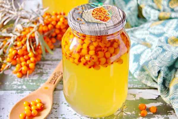 Как приготовить облепиху с сахаром и заготовить на зиму