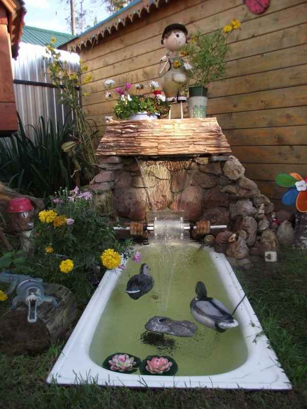 Декоративный фонтан из ванны своими руками