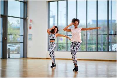 Леггинсы для дэнс-фитнеса женские розовые с графикой DOMYOS - купить в интернет-магазине